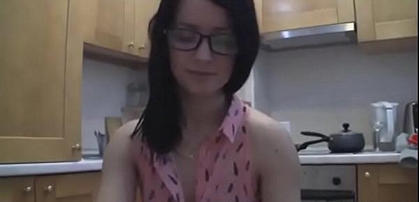  splendid teen with glasses chatting in the kitchen